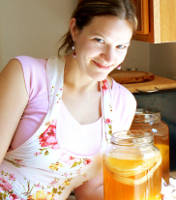 Hannah Crum, The Kombucha Mamma and a jar of Kombucha Cultures, also known as SCOBYs, "symbiotic culture of bacteria and yeast"