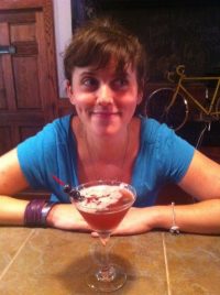 Marian Flaxman, owner of Culture Shock, a fermented foods cafe in Ithaca, NY, poses with her favorite Kombucha Cocktail, The Twisted Bliss