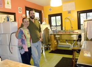 Rachel and Tarek Kanaan of Unity Vibration Kombucha show off their home brewery set up