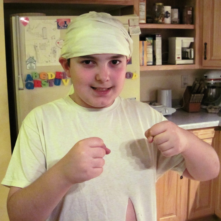 Laurie's son rocks the headwrapping for his SCOBY Skull Cap Cure Treatment